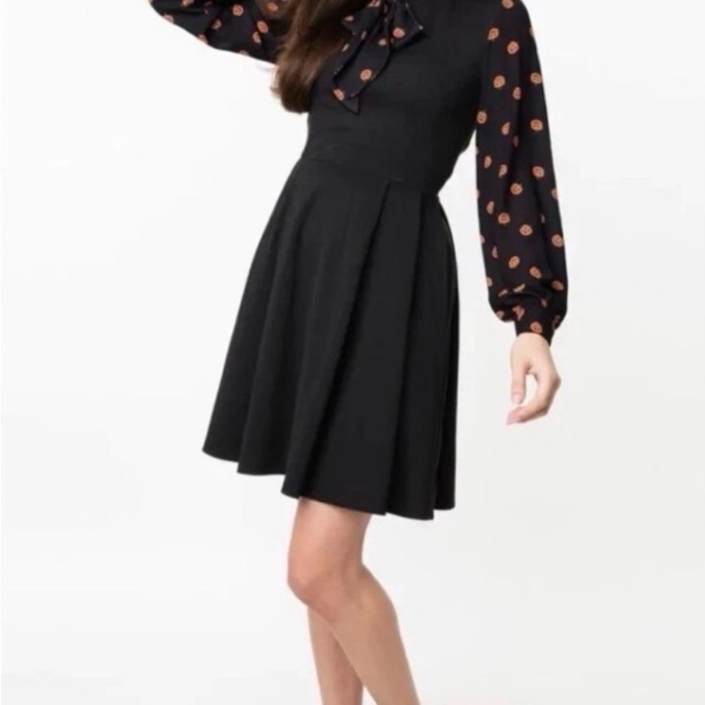 Chic Black Dress with Polka Dot Accents